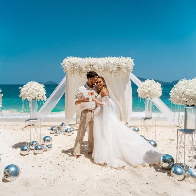 Romantic Beach wedding ceremony in Phuket with turquoise water and white sand