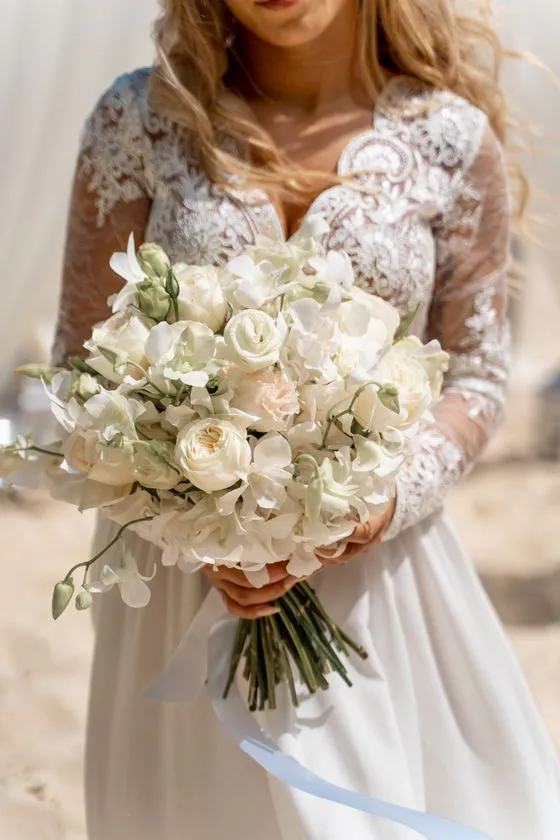 Cascading wedding bouquet with pink orchids and white lilies in Phuket