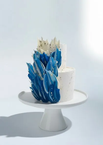 Exquisite custom wedding cake for resort wedding in Phuket with tropical elements