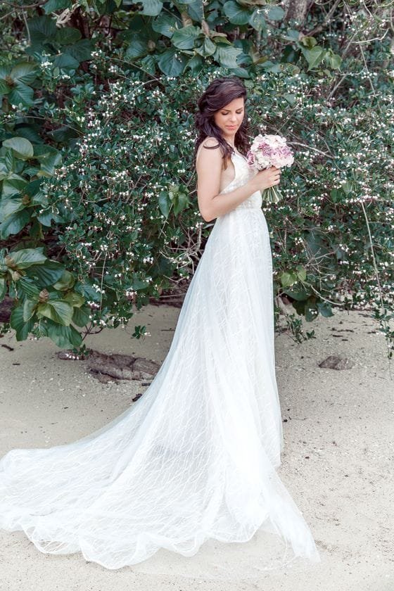 Beautiful wedding dress rental in Phuket - elegant white gown with flowing train